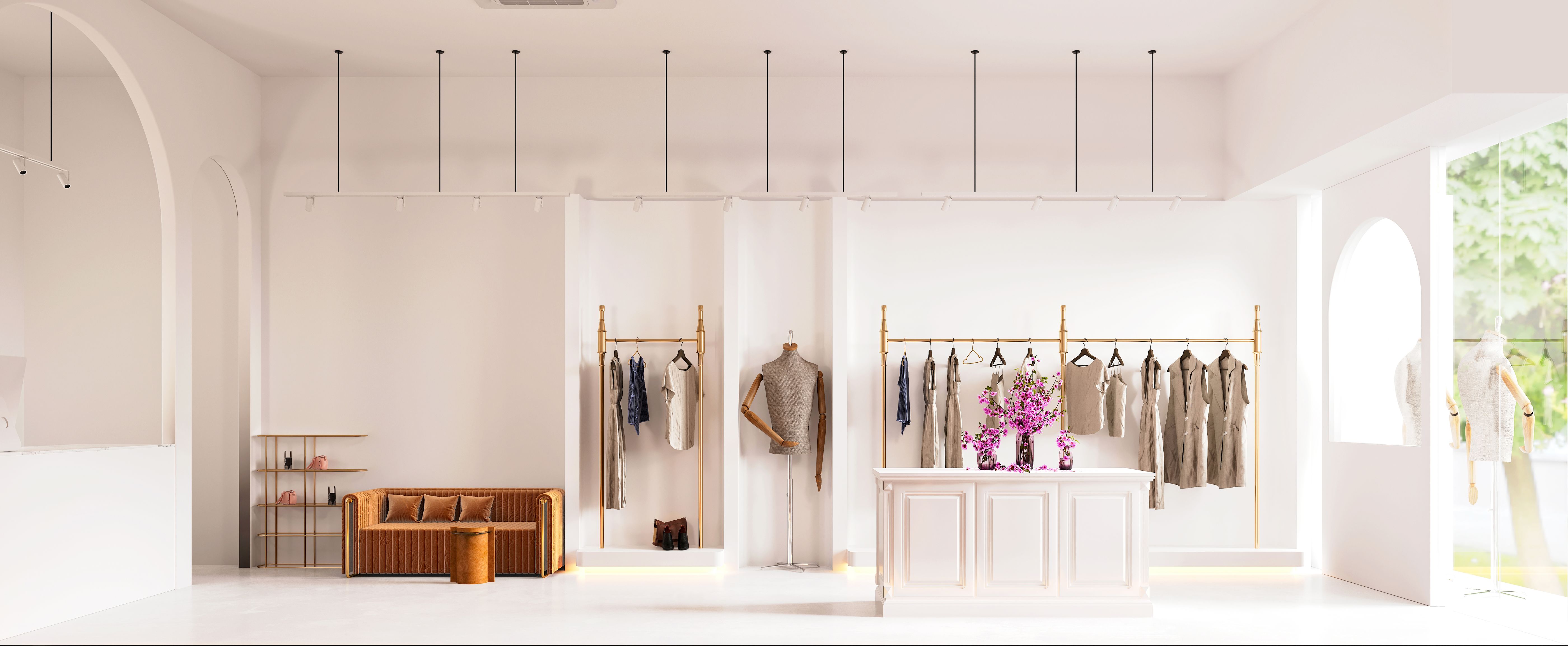 The bright Lonca boutique with clothing rails and a tailor’s mannequin